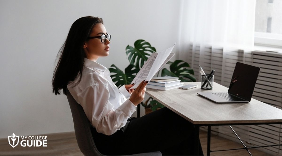 Woman preparing requirements for Online Law Degree